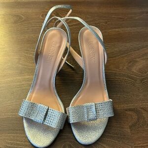 J Crew heels 3”.  I wore it once only ar my daughter’s wedding.